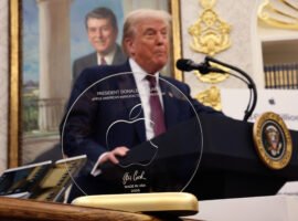 Apple made a 24k gold and glass statue for Donald Trump