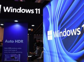 Windows 11 logo seen on a booth at Comic Con event