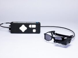 Blind patients read again with smart glasses-linked eye implant