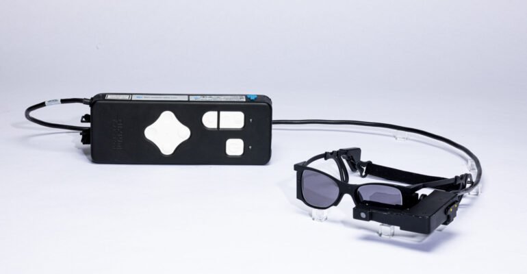 Blind patients read again with smart glasses-linked eye implant
